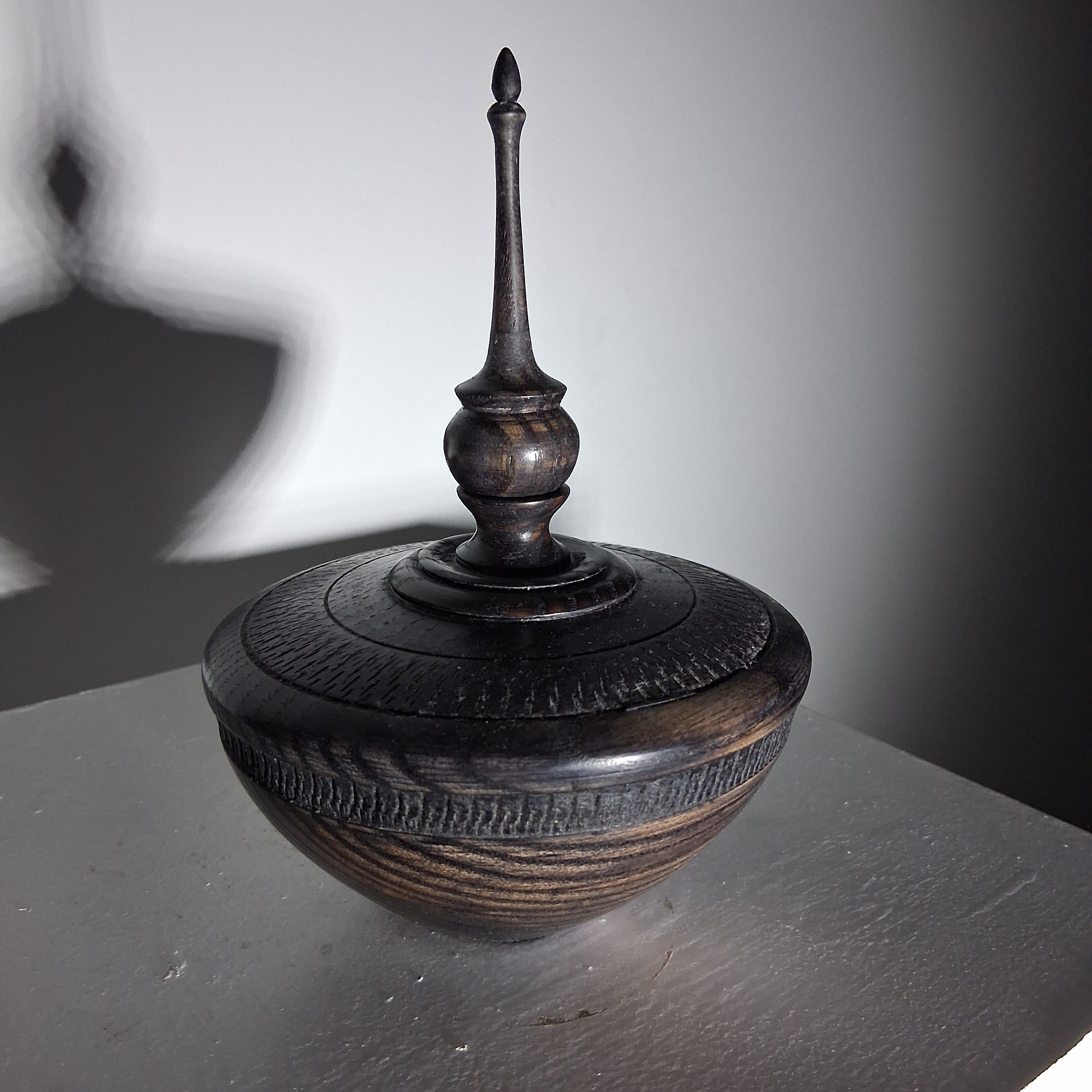 Hollow Form in Coloured Black Ash with Textured Band and Finial