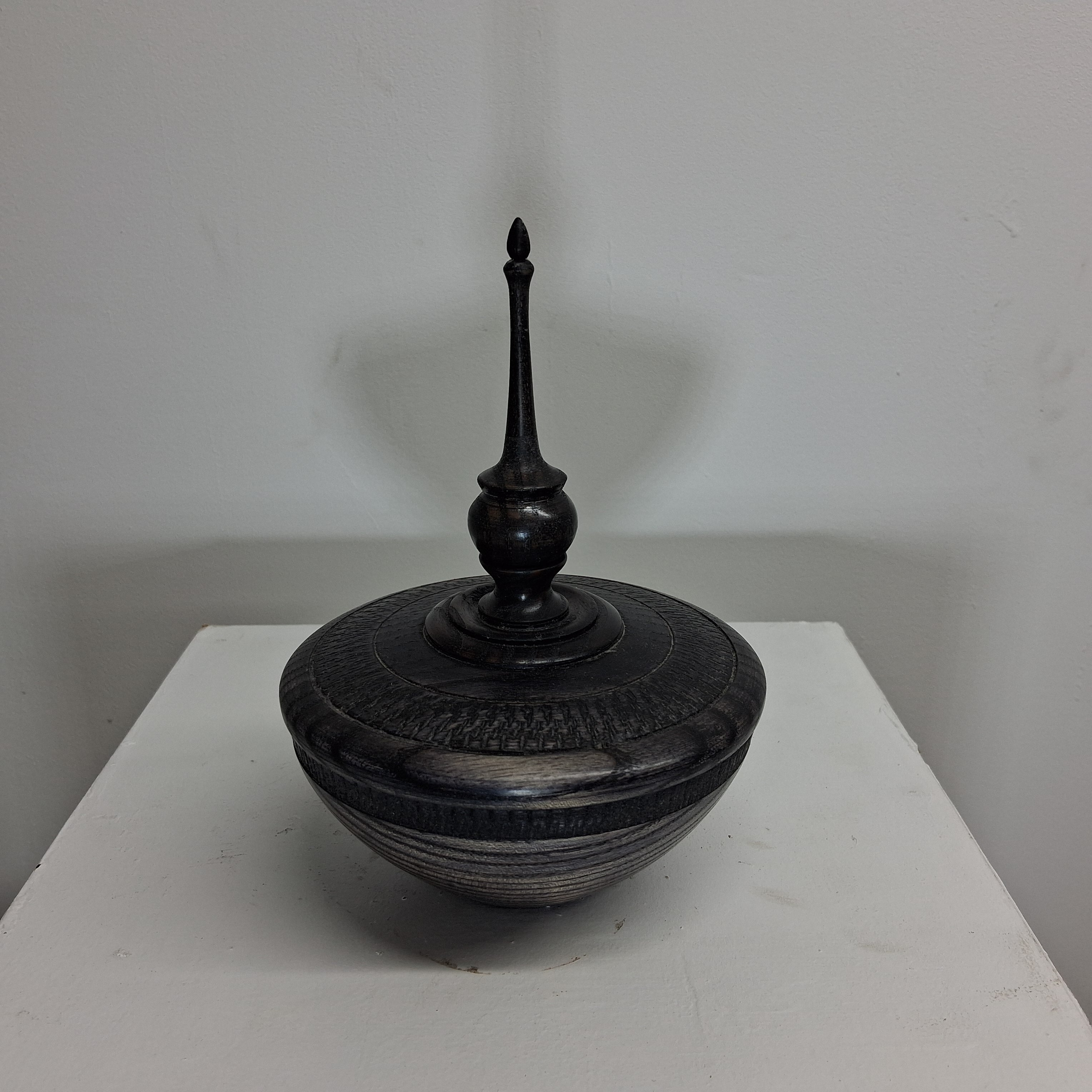 Hollow Form in Coloured Black Ash with Textured Band and Finial